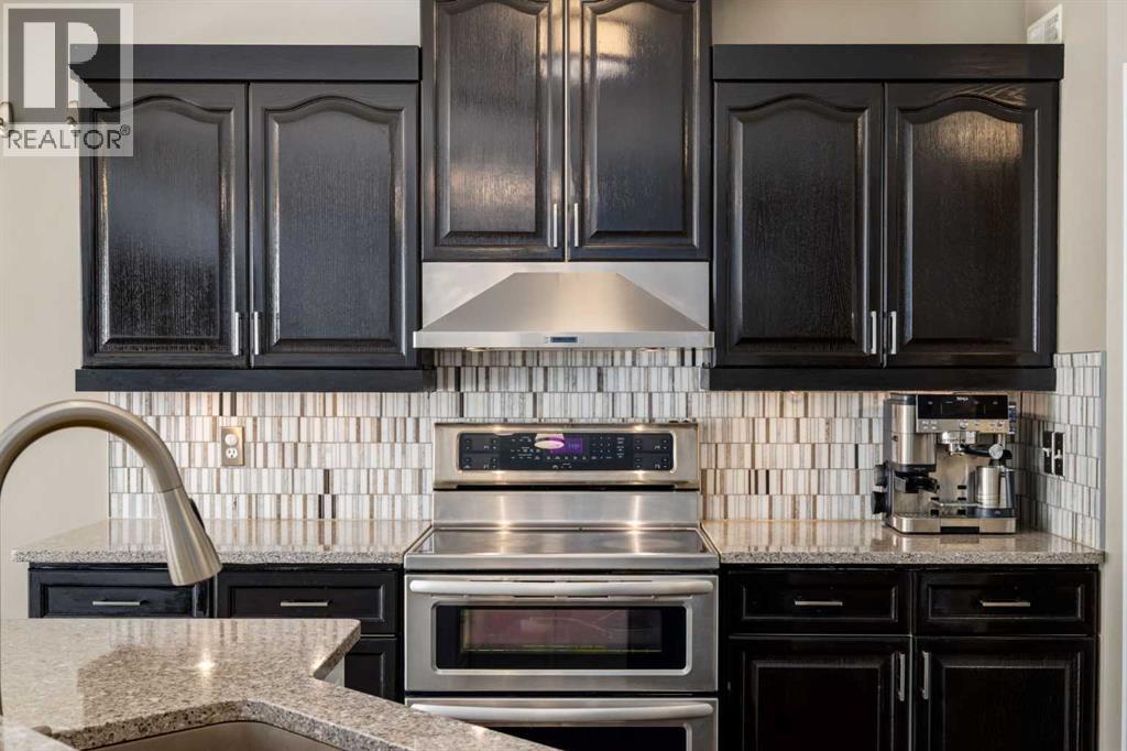 331 Sierra Madre Court SW, Calgary, Alberta  T3H 3G7 - Photo 12 - A2299948