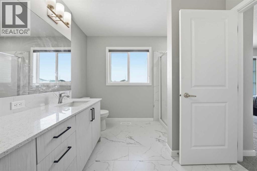 704 Creekstone Circle Sw, Calgary, Alberta  T2X 4Y6 - Photo 17 - A2286641