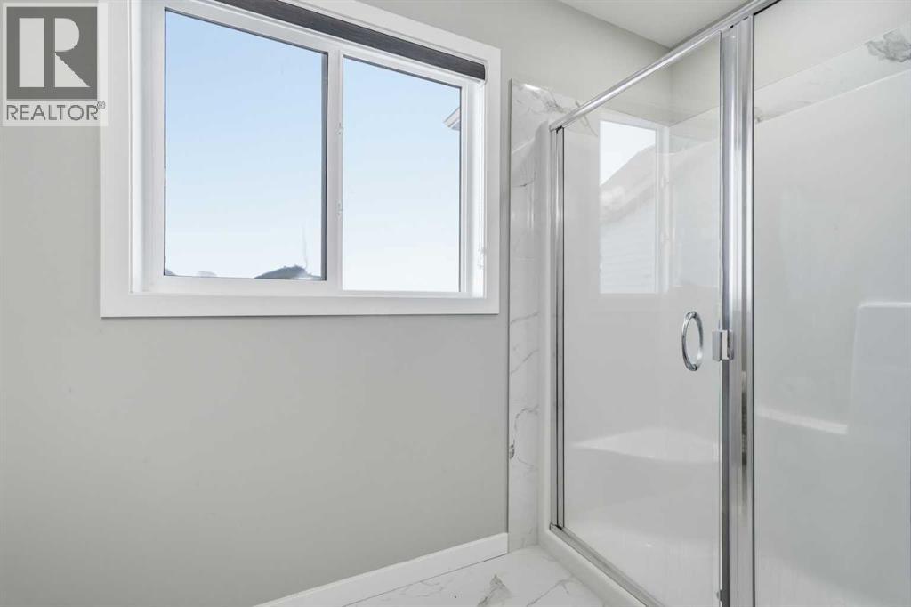 704 Creekstone Circle Sw, Calgary, Alberta  T2X 4Y6 - Photo 20 - A2286641