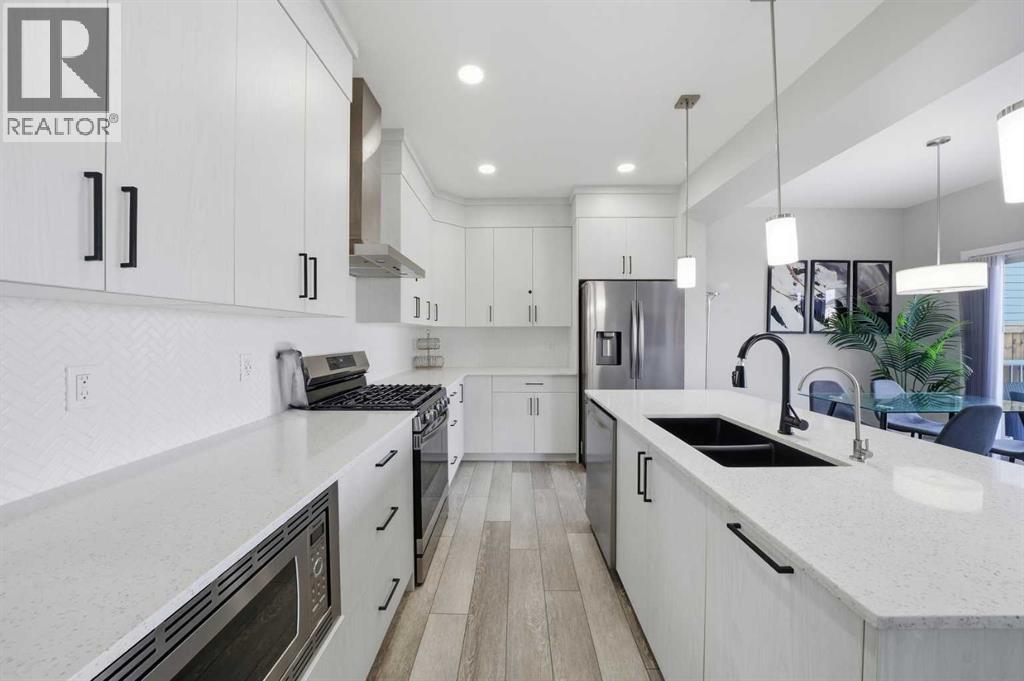 704 Creekstone Circle Sw, Calgary, Alberta  T2X 4Y6 - Photo 6 - A2286641