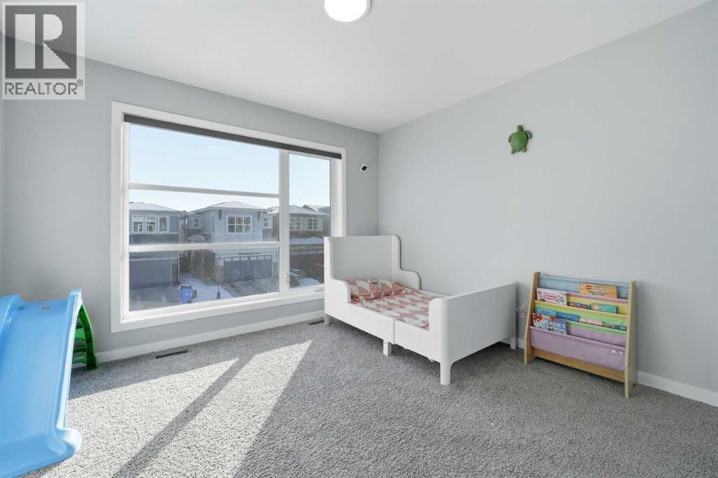 704 Creekstone Circle Sw, Calgary, Alberta  T2X 4Y6 - Photo 22 - A2286641