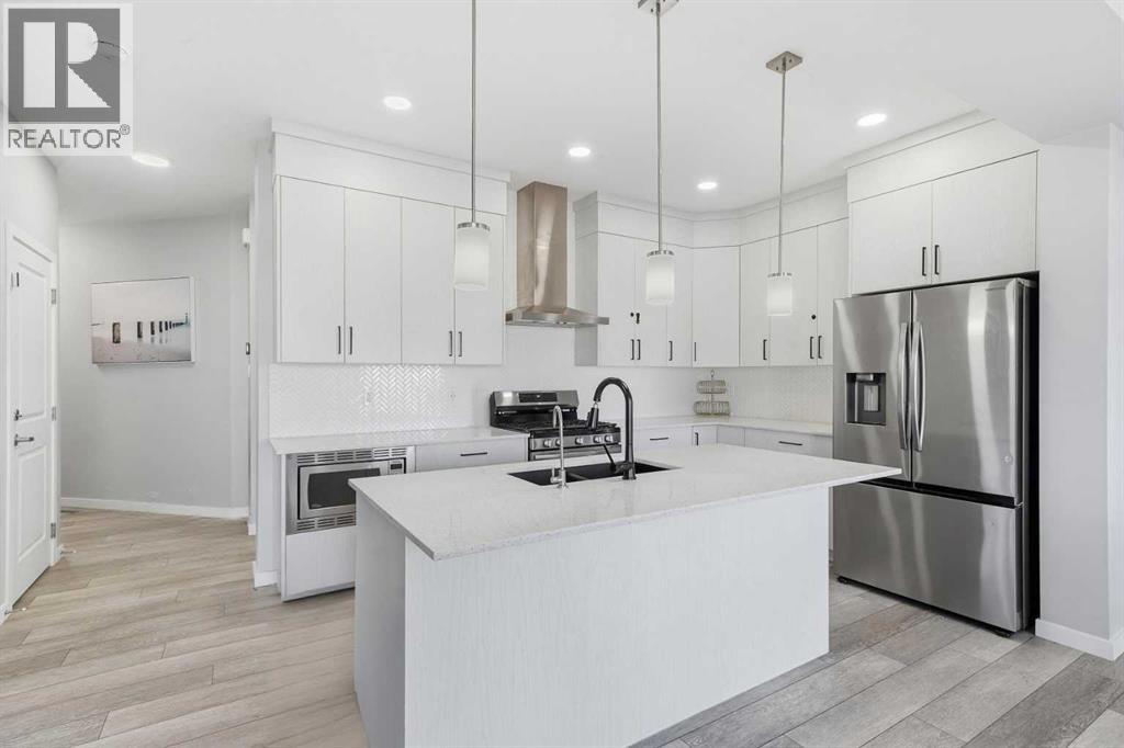 704 Creekstone Circle Sw, Calgary, Alberta  T2X 4Y6 - Photo 5 - A2286641