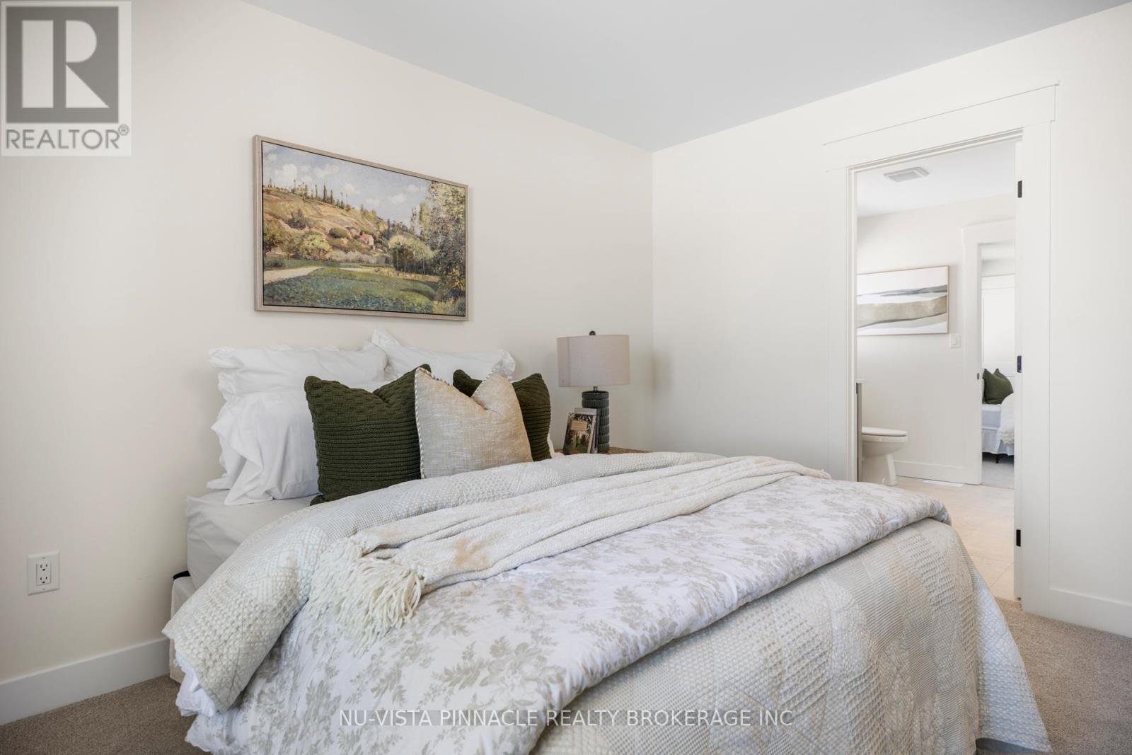 202 Harvest Lane, Thames Centre, Ontario  N0L 1G2 - Photo 38 - X12660874