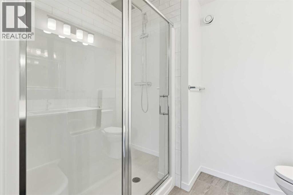 168 Belmont Villas Sw, Calgary, Alberta  T2W 4W7 - Photo 25 - A2280594