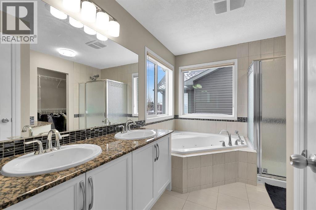 177 Cougar Ridge Close Sw, Calgary, Alberta T3H 0V4 - Photo 18 - A2292847