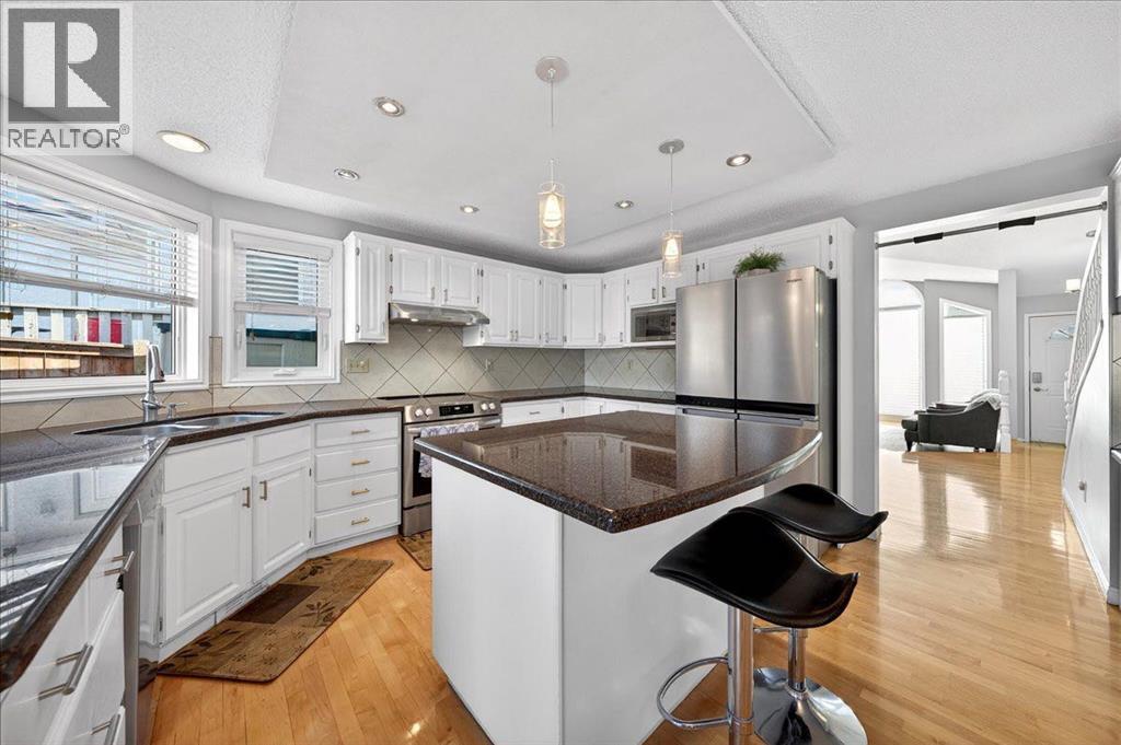 137 Woodbrook Road SW, Calgary, Alberta  T2W 6C6 - Photo 11 - A2281507