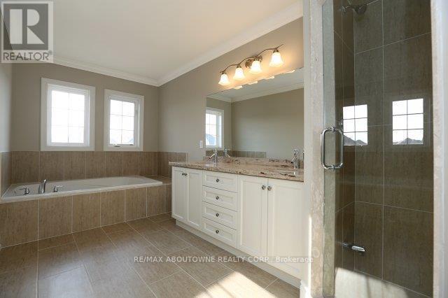 2430 Whistling Springs Crescent, Oakville, Ontario L6M 0C4 - Photo 18 - W12982034