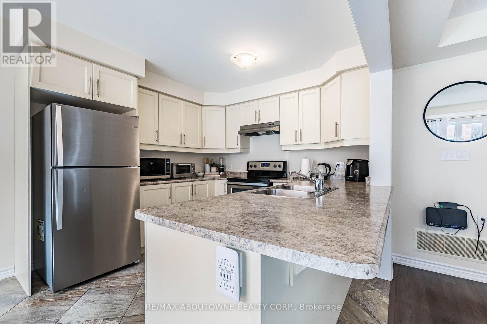 1239 Mulroney Heights, Milton, Ontario  L9E 1G1 - Photo 23 - W12982040