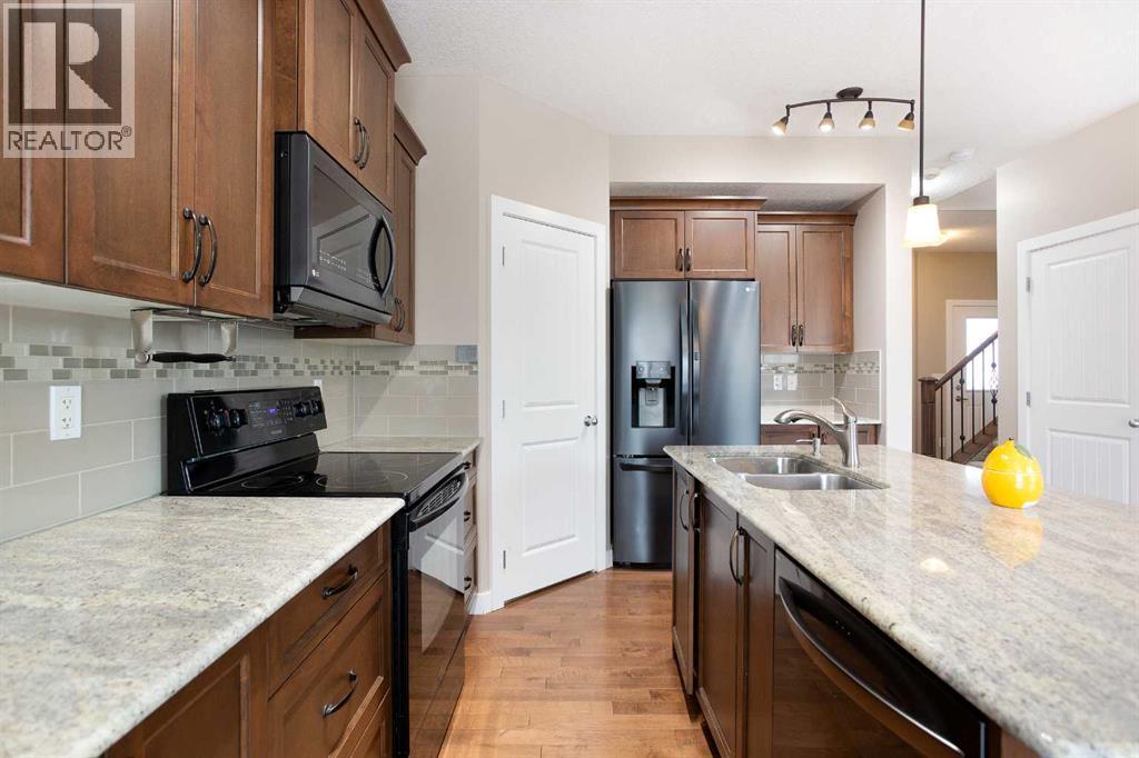 147 Morningside Mews SW, Airdrie, Alberta  T4B 0X2 - Photo 8 - A2297845