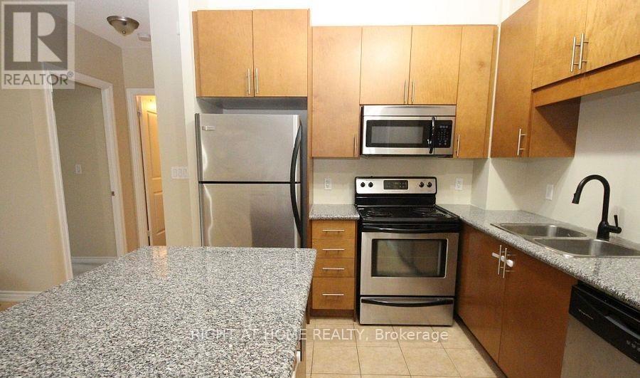 209 - 135 Wynford Drive, Toronto, Ontario  M3C 0J4 - Photo 4 - C12982536