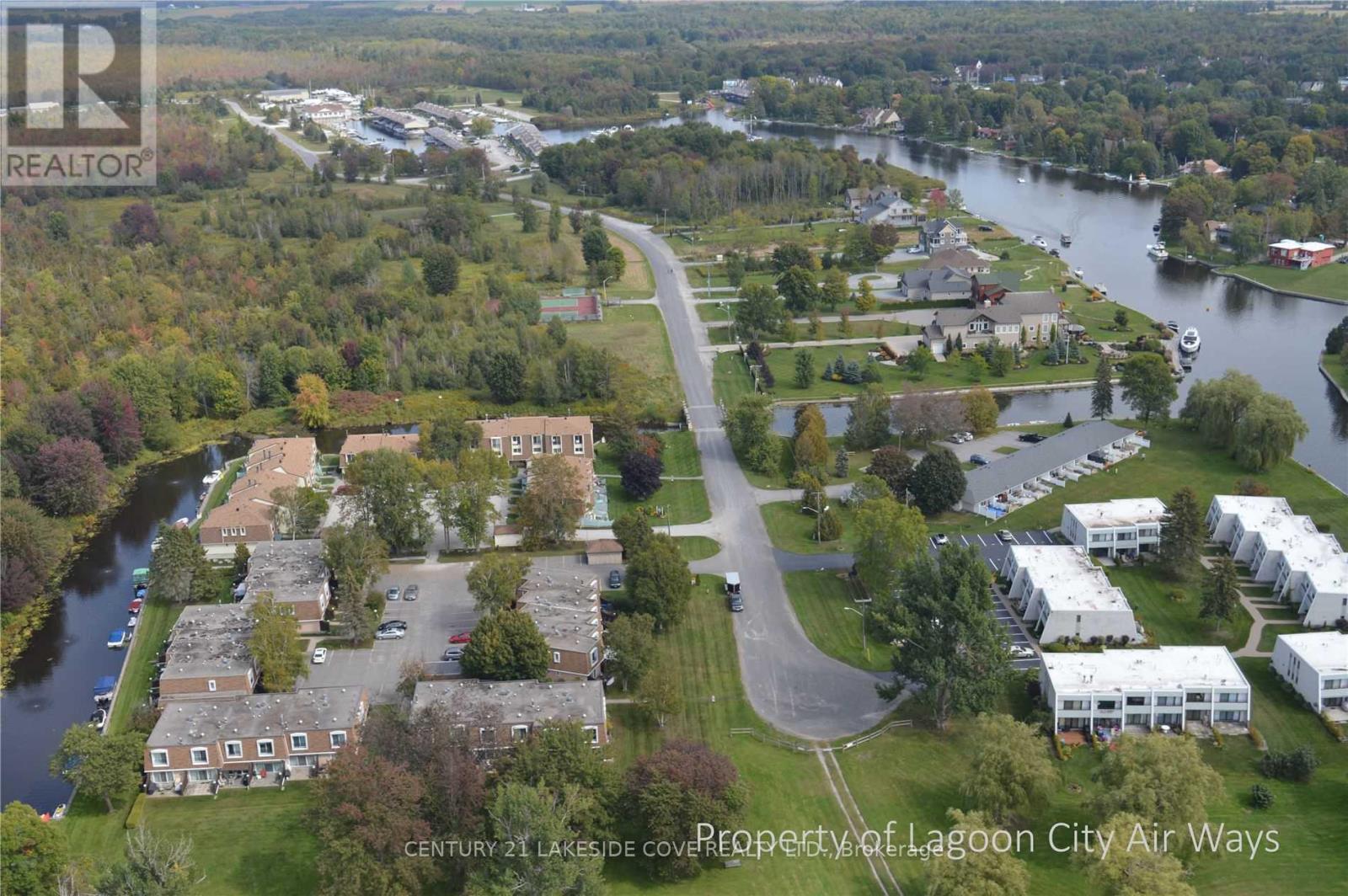 Unit 4 - 4 Paradise Boulevard, Ramara, Ontario  L0K 1B0 - Photo 1 - S12982464