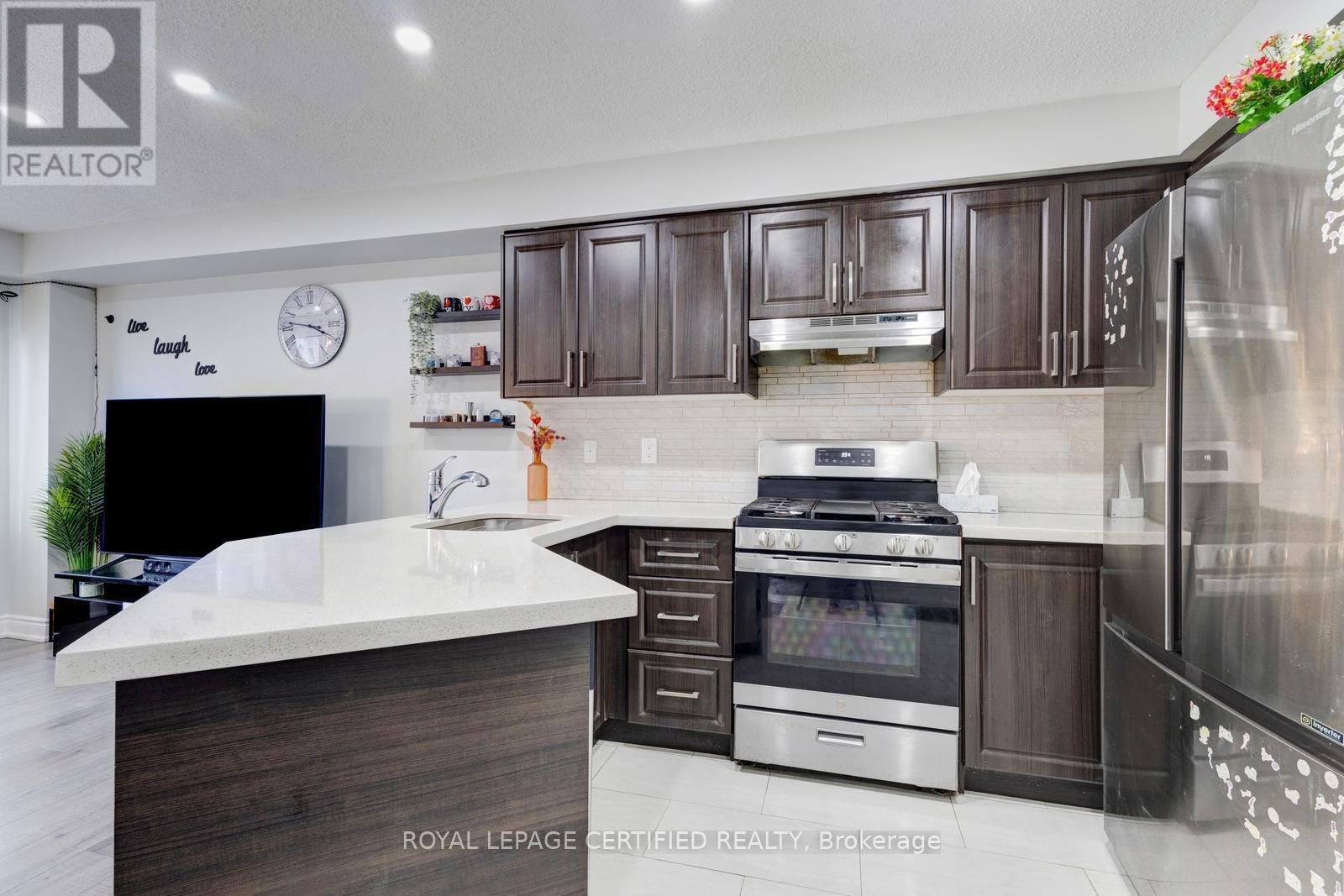 299 Pressed Brick Drive N, Brampton, Ontario  L6V 4L2 - Photo 6 - W12978796