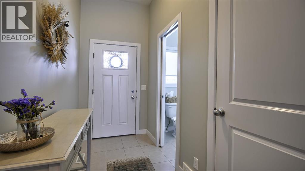 135 Reunion Loop Nw, Airdrie, Alberta  T4B 4J6 - Photo 4 - A2291091