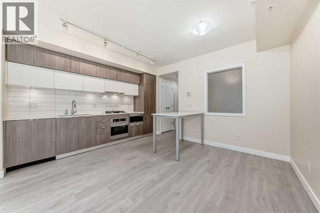 110, 51 Waterfront Mews SW, Calgary, Alberta  T2P 0X3 - Photo 7 - A2300672