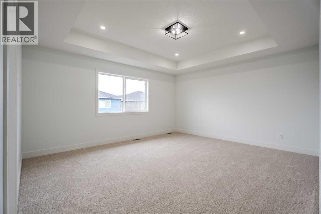 1433 Scarlett Ranch Boulevard, Carstairs, Alberta  T0M 0N0 - Photo 18 - A2283176