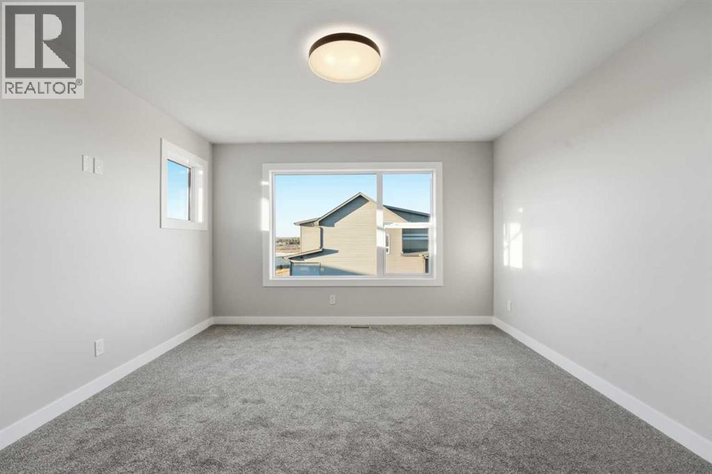 62 Vista Close, Blackfalds, Alberta  T4M 0L3 - Photo 36 - A2225489