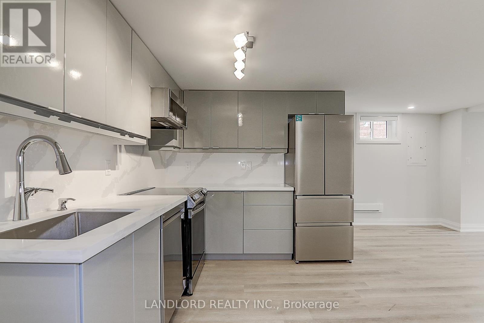 Lower Unit - 115 Livingstone Avenue, Toronto, Ontario  M6E 2L7 - Photo 15 - W12983318