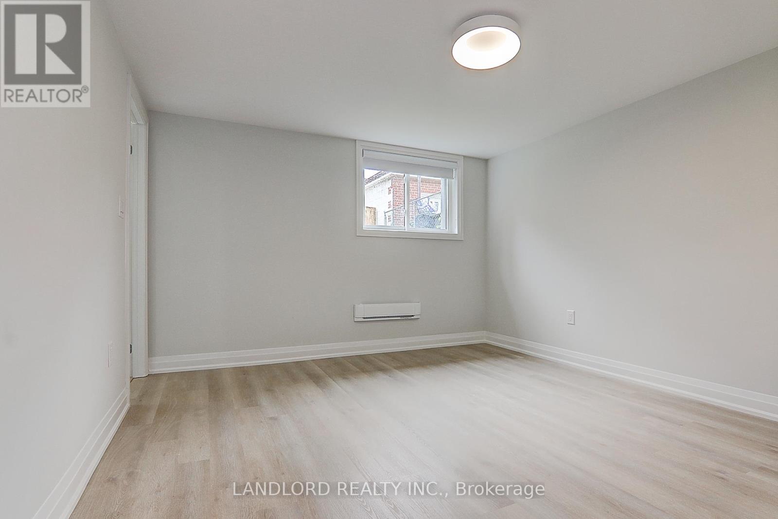 Lower Unit - 115 Livingstone Avenue, Toronto, Ontario  M6E 2L7 - Photo 19 - W12983318