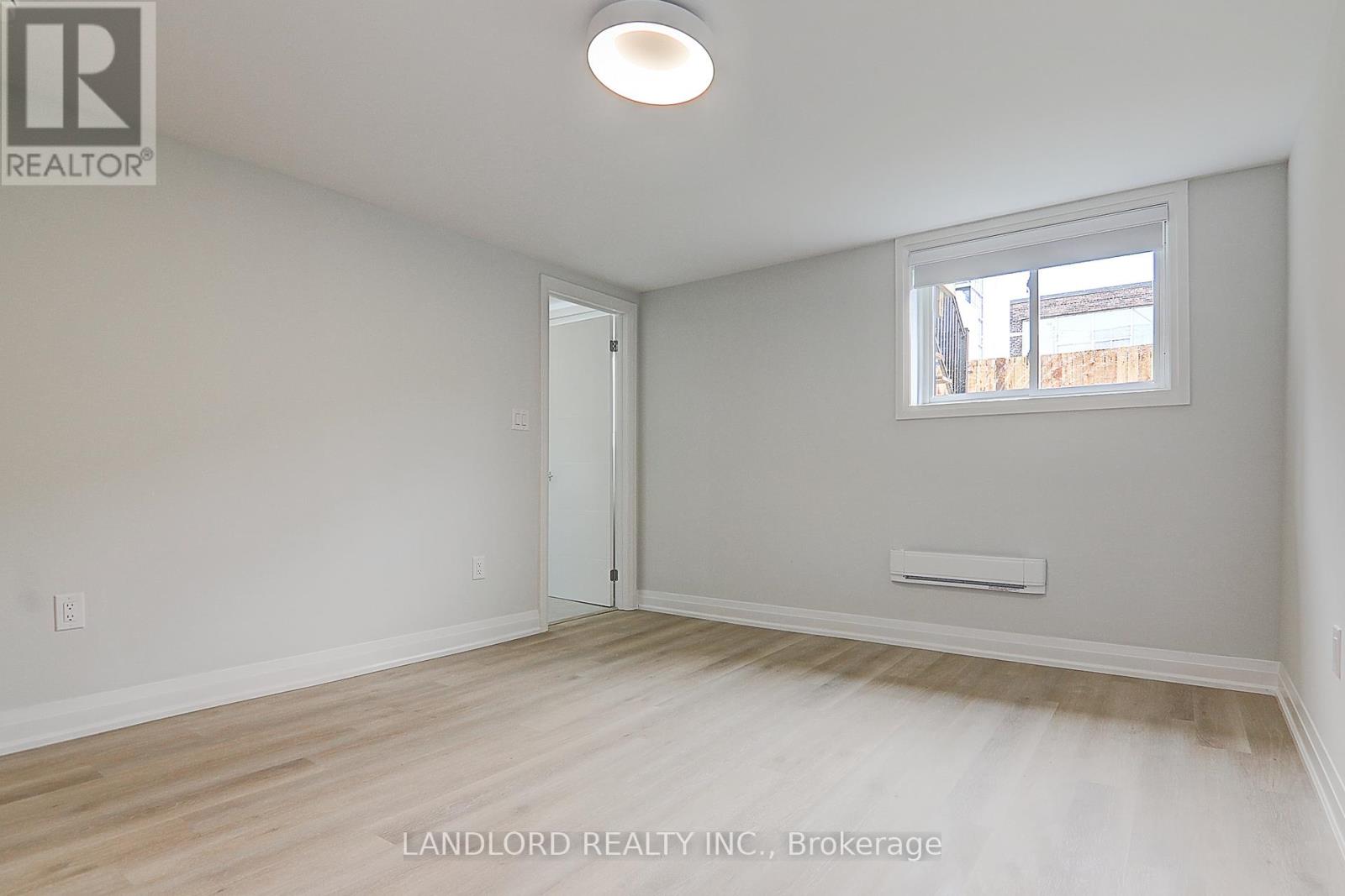 Lower Unit - 115 Livingstone Avenue, Toronto, Ontario  M6E 2L7 - Photo 20 - W12983318