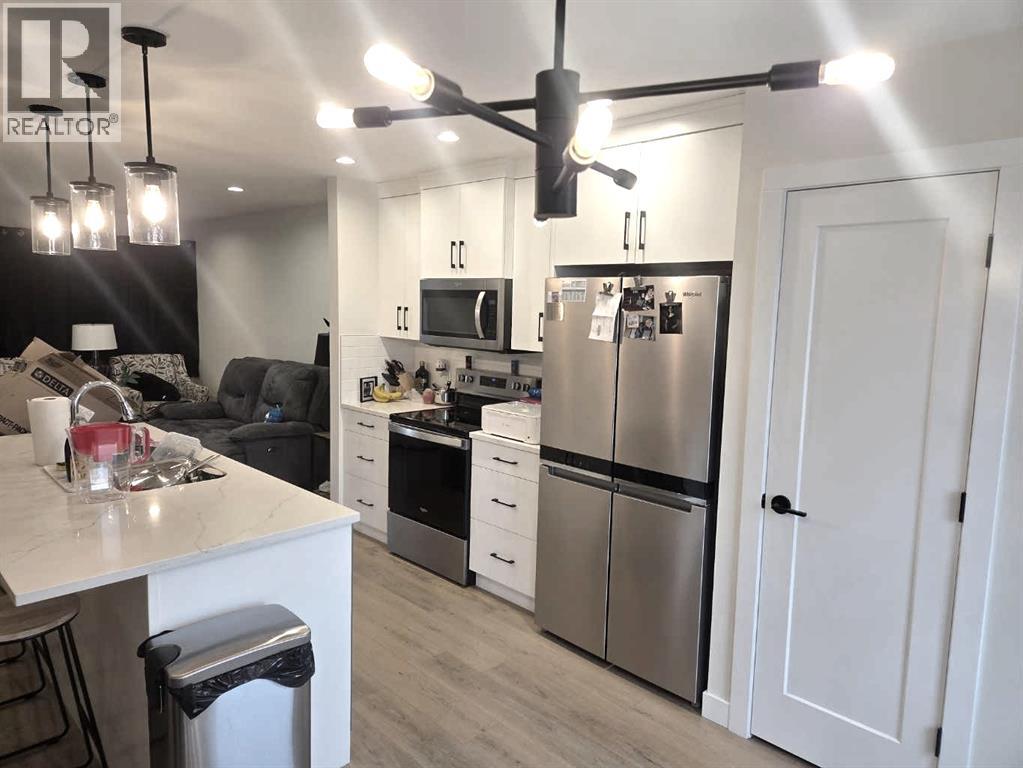 A & B, 50 Sage Brush Avenue, Taber, Alberta  T1G 0E8 - Photo 2 - A2300070