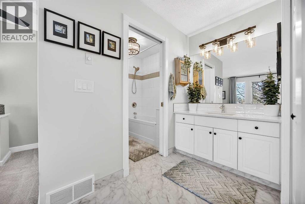 94 Candle Terrace SW, Calgary, Alberta  T2W 6G7 - Photo 29 - A2296042