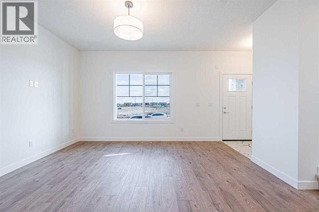 129 Dawson Wharf View, Chestermere, Alberta  T1X 2W3 - Photo 3 - A2293536