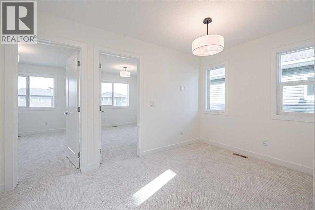 129 Dawson Wharf View, Chestermere, Alberta  T1X 2W3 - Photo 12 - A2293536