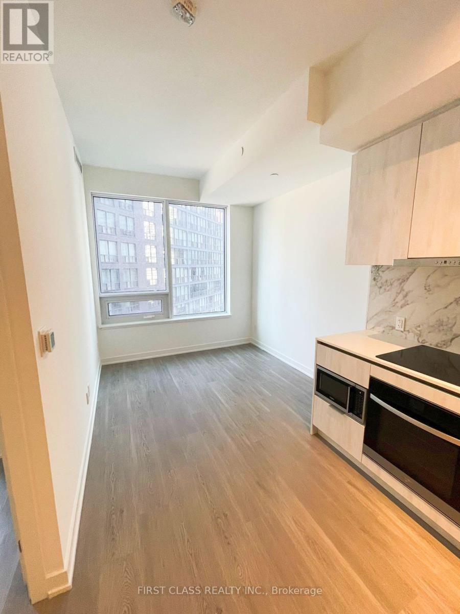 1001 - 8 Wellesley Street W, Toronto, Ontario  M4Y 0J5 - Photo 3 - C12983604