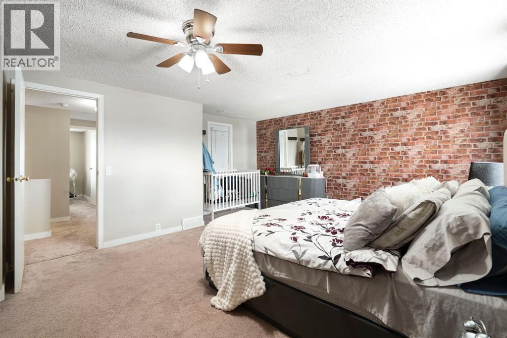 89 Bermuda Lane NW, Calgary, Alberta  T3K 2K1 - Photo 21 - A2299379