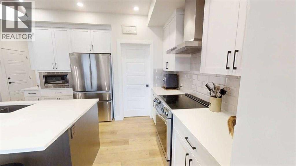 28 Aster Link, Okotoks, Alberta  T1S 5Y1 - Photo 8 - A2296225