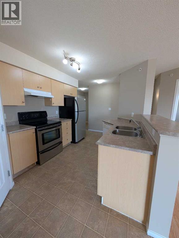 418, 1616 Saamis Drive NW, Medicine Hat, Alberta T1C 4X2 - Photo 7 - A2300099