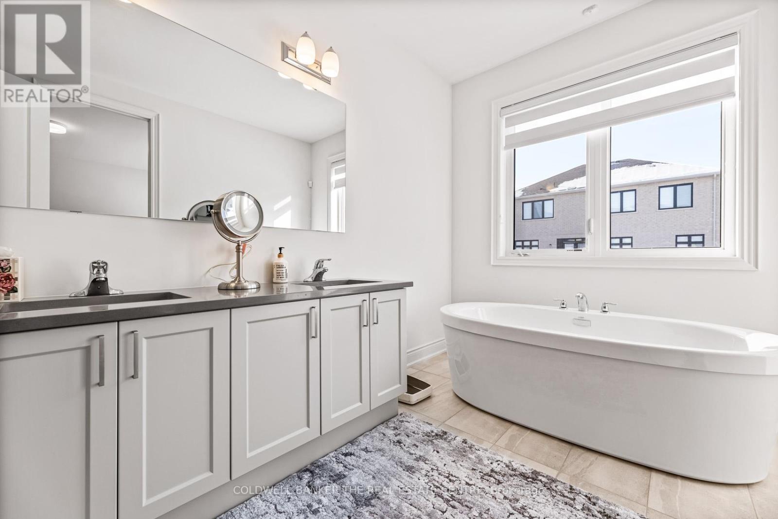 28 Bellflower Crescent, Adjala-Tosorontio, Ontario  L0G 1W0 - Photo 19 - N12984010