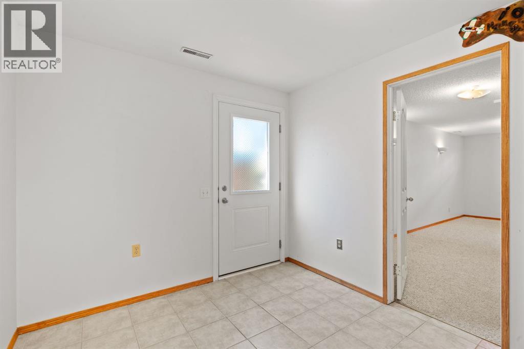 219 Quigley Drive, Cochrane, Alberta  T4C 1T3 - Photo 30 - A2299527