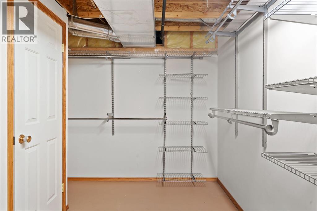 219 Quigley Drive, Cochrane, Alberta  T4C 1T3 - Photo 34 - A2299527