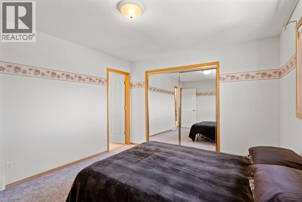 219 Quigley Drive, Cochrane, Alberta  T4C 1T3 - Photo 20 - A2299527