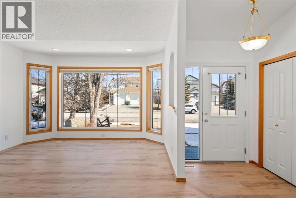 219 Quigley Drive, Cochrane, Alberta  T4C 1T3 - Photo 3 - A2299527