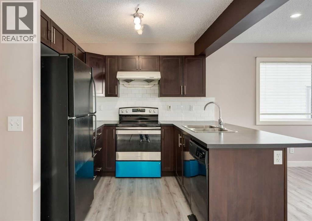 14 Pantego Lane NW, Calgary, Alberta  T3K 0T1 - Photo 6 - A2299939