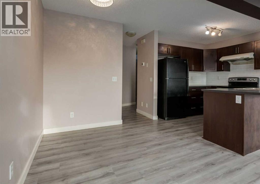 14 Pantego Lane NW, Calgary, Alberta  T3K 0T1 - Photo 5 - A2299939