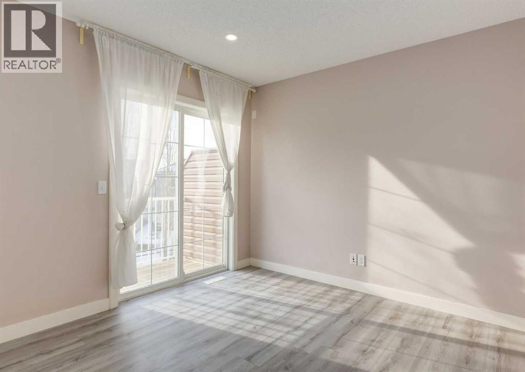 14 Pantego Lane NW, Calgary, Alberta  T3K 0T1 - Photo 13 - A2299939