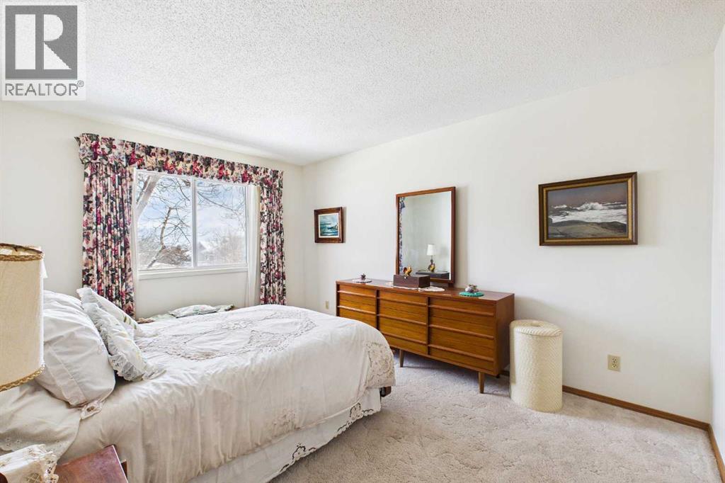 115 Macewan Park Heights NW, Calgary, Alberta  T3K 3W6 - Photo 18 - A2297699