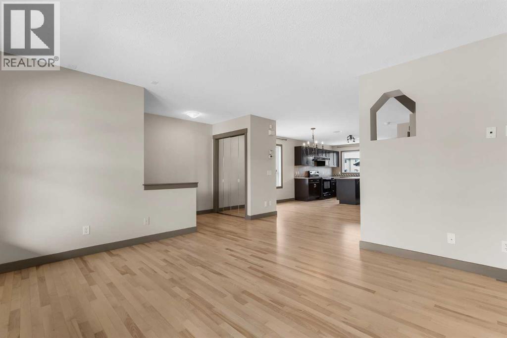 106 Luxstone Way Sw, Airdrie, Alberta  T4B 0H6 - Photo 5 - A2290938