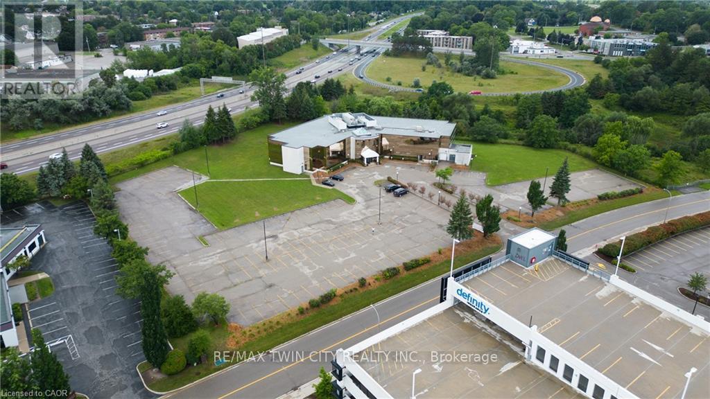 575 Riverbend Drive, Kitchener, Ontario  N2K 3S3 - Photo 4 - X12984402