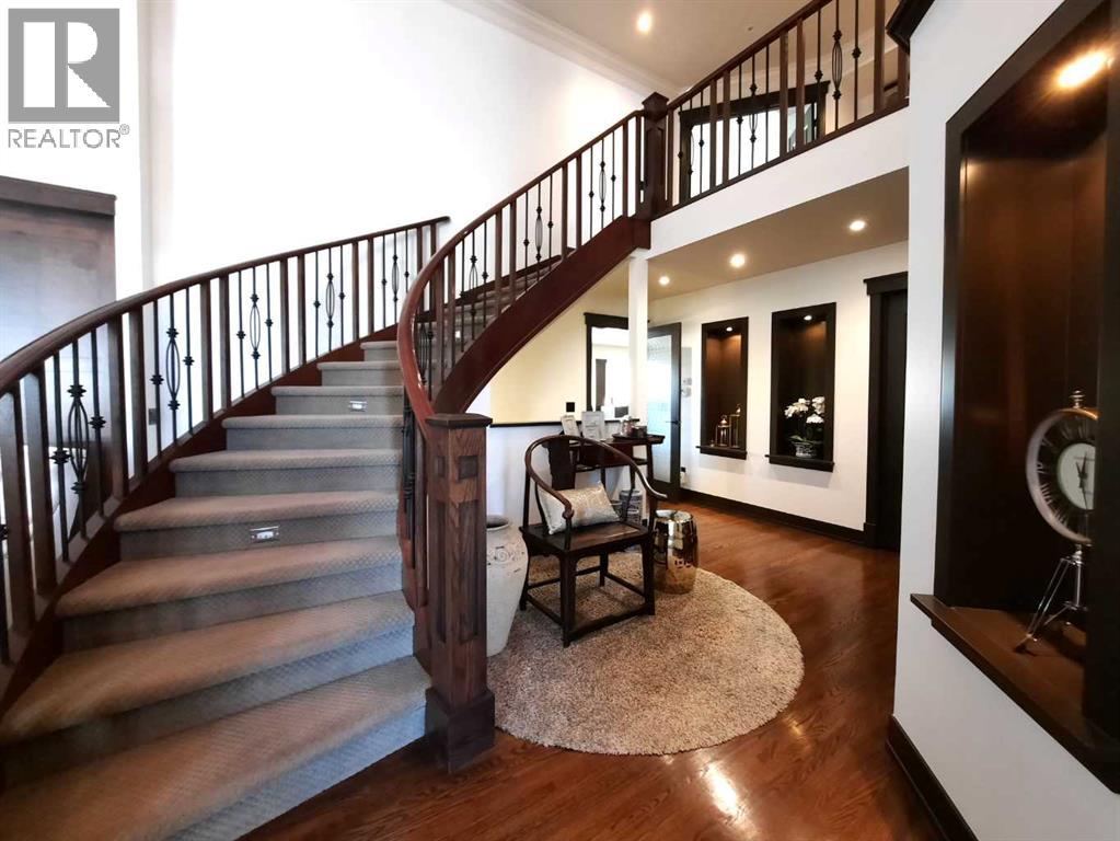 16021 Mckenzie Lake Way SE, Calgary, Alberta  T2Z 1Y1 - Photo 5 - A2297710