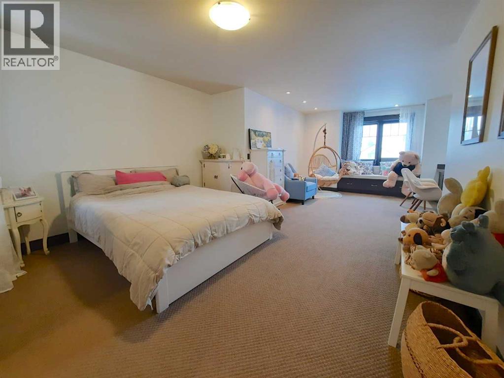 16021 Mckenzie Lake Way SE, Calgary, Alberta  T2Z 1Y1 - Photo 32 - A2297710