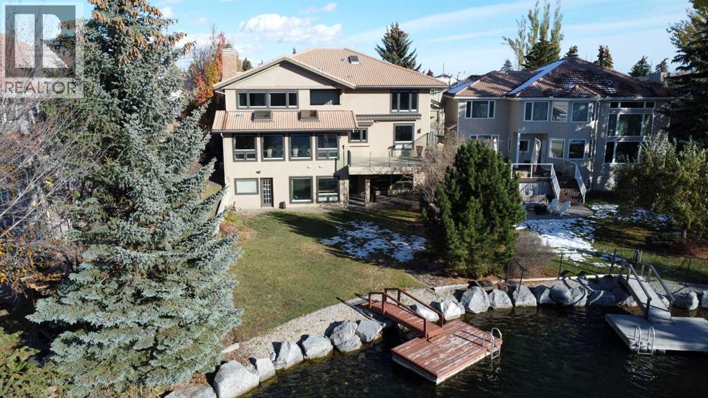 16021 Mckenzie Lake Way SE, Calgary, Alberta  T2Z 1Y1 - Photo 2 - A2297710