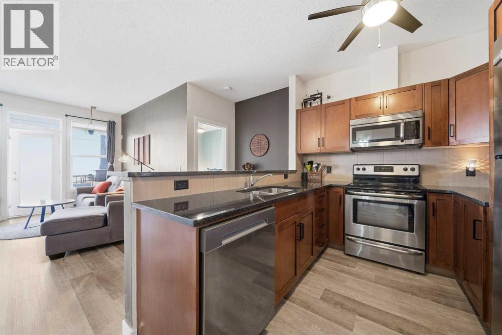 310, 76 Panatella Road NW, Calgary, Alberta T3K 0V4 - Photo 4 - A2290361