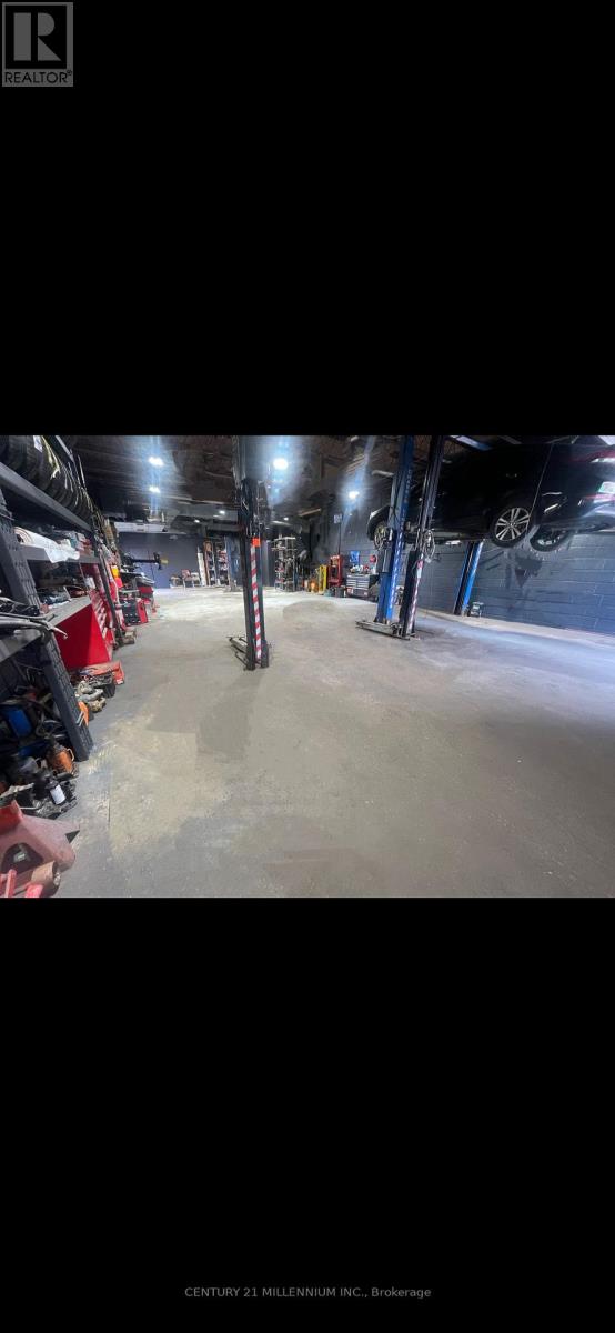 8 Milvan Drive, Toronto, Ontario  M9L 1Z2 - Photo 7 - W12984696