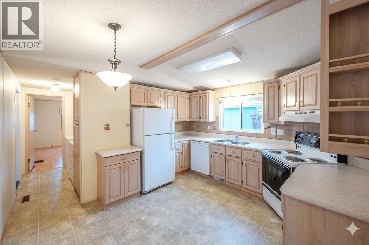 6778 TUCELNUIT Drive Unit# 39 Oliver Photo 5