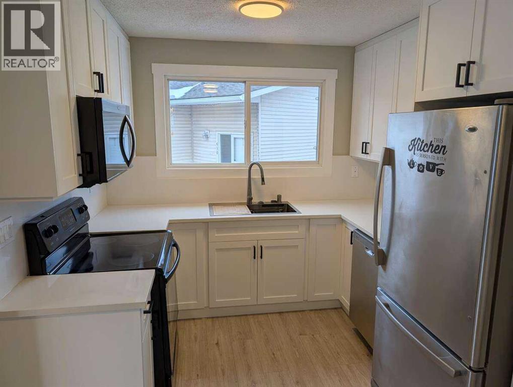 528 Queensland Place Se, Calgary, Alberta  T2J 4T3 - Photo 10 - A2291797