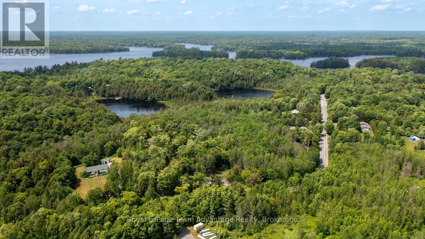 40 Sunnyshore Park Drive, Mckellar, Ontario  P2A 0B5 - Photo 6 - X12985016